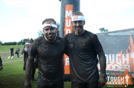 Lyreco UK and Ireland MD Peter Hradisky (left), and Morten Wiil (right), after successfully completing the Tough Mudder Half event at Cholmondeley Estate, Cheshire.